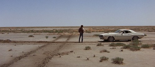 O'Hjul med din glede! Messias-figuren Kowalski i et sårt øyeblikk. Fra filmen «Vanishing Point»